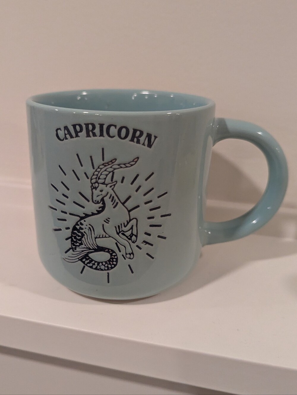 Capricorn Ceramic Mug in Light Teal Blue